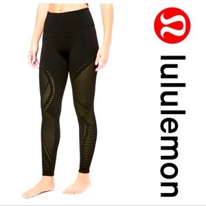 Lululemon black reveal cutout seamless legging. Amazing used condition!